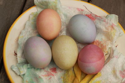 High angle view of multi colored eggs