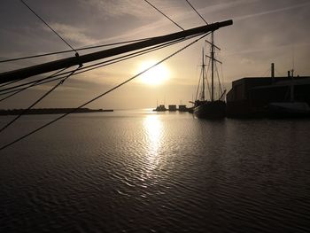 Silhouette of marina at sunset