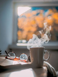 Close-up of coffee cup on table