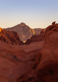 Scenic view of arid landscape against clear sky