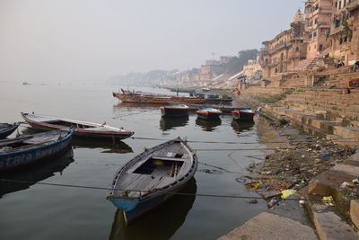 Boats moored in sea