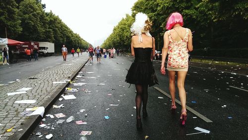 Woman walking on road