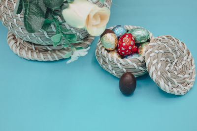 High angle view of eggs in basket on table