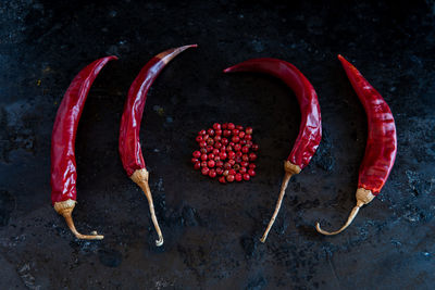 High angle view of red chili peppers on table