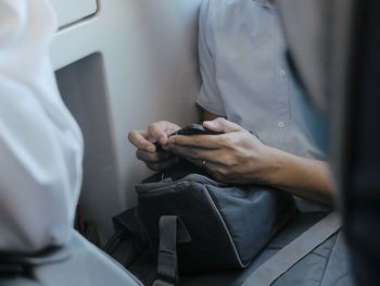 Close-up of woman using phone