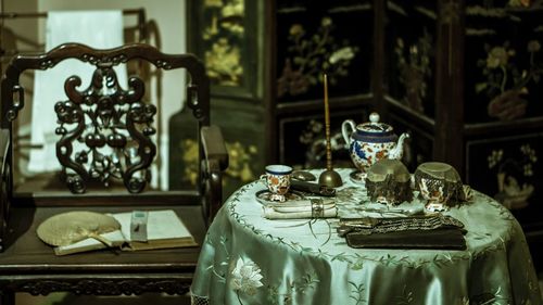 Close-up of tea set on table at home