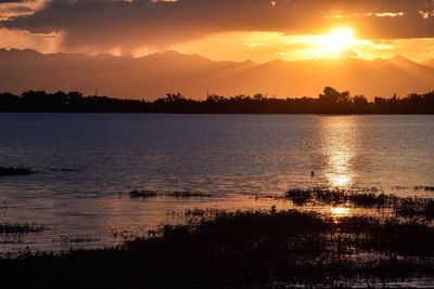 Scenic view of dramatic sky during sunset