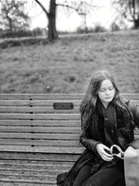 Beautiful young woman looking away