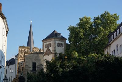 Low angle view of bell tower against clear sky