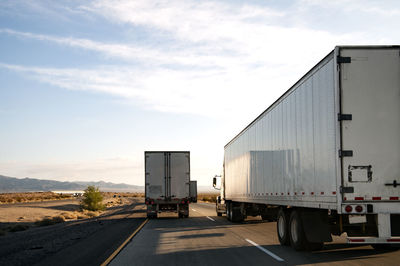 Eighteen wheelers trucking down the interstate