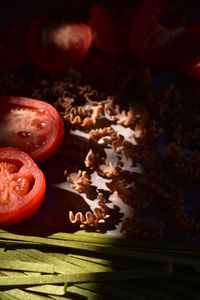 Close-up of red chili peppers on table