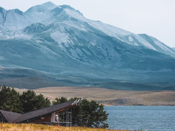 Scenic view of snowcapped mountains against sky