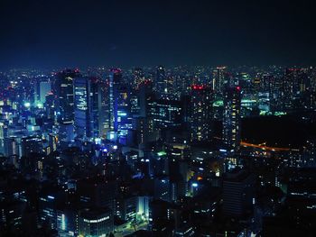 High angle shot of illuminated cityscape at night