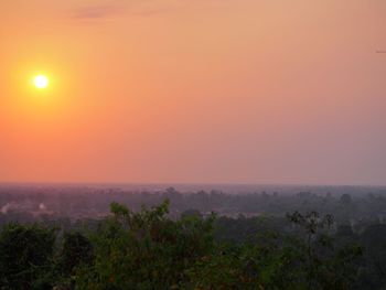 Scenic view of landscape against sky during sunset