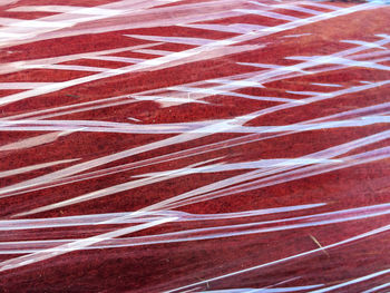 Close-up of fabric covered with rippled plastic