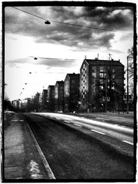 Street in city against sky