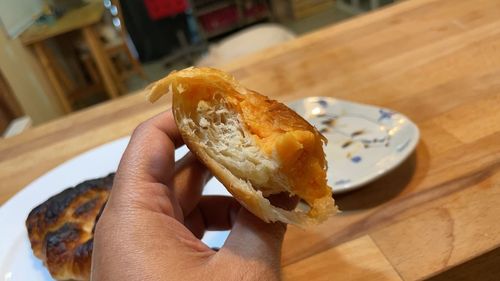 Close-up of hand holding ice cream