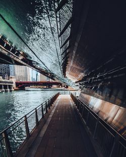 Bridge over river reflected