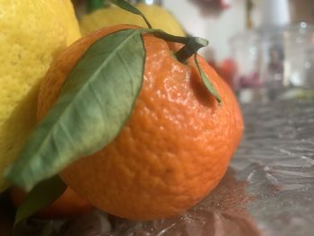 Close-up of orange fruit on table