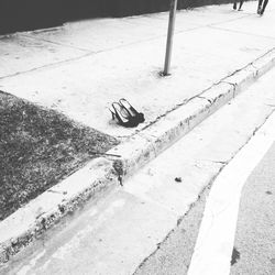 Shadow of woman on road