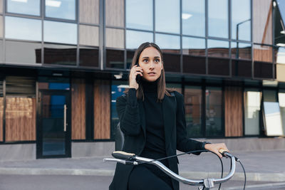 Young woman using mobile phone