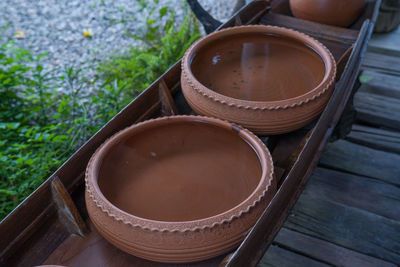 High angle view of water in containers on table