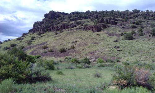 Scenic view of rocky mountains against sky