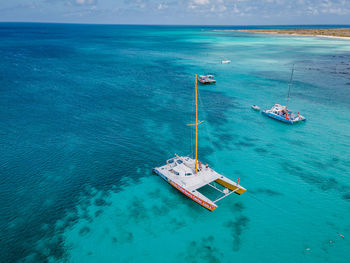 High angle view of sailboat in sea against sky