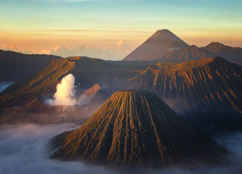 Scenic view of mountains against sky during sunset