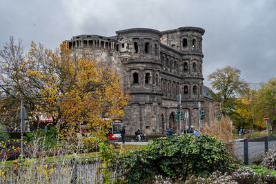 Historic building against cloudy sky