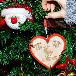 Heart shape hanging on christmas tree