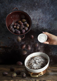 Still life plum cake with levitation plums, autumn delicious season food