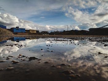 Surface level of beach against sky