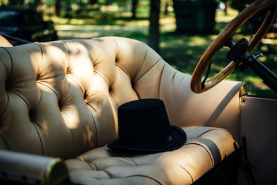 Close-up of hat on car seat