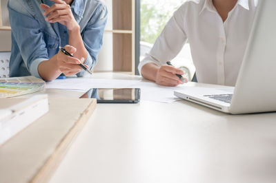 People working on table