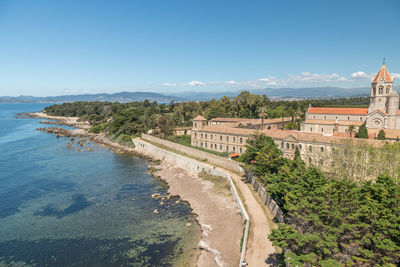 Panoramic view of building against blue sky