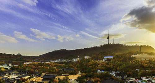 Townscape against sky during sunset