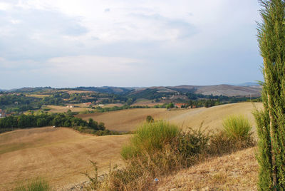 Scenic view of land against sky