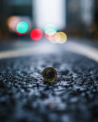 Close-up of snail on road