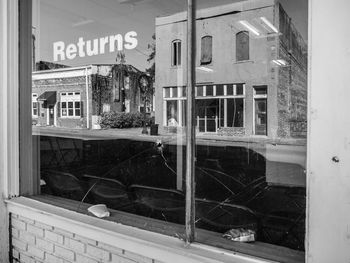 Close-up of text on window