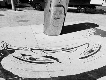 High angle view of graffiti on wall in park