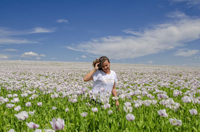 Full length of woman standing on field