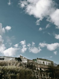 Built structure against cloudy sky