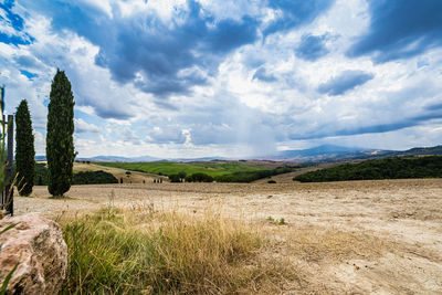 Scenic view of field against sky in tuscany val d orcia