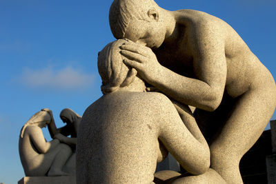 Low angle view of statue against sky