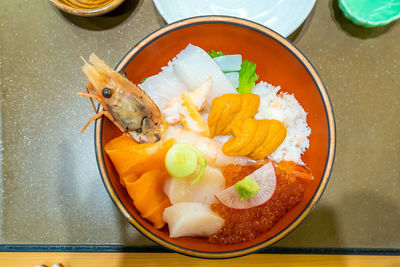 High angle view of fruits in bowl on table