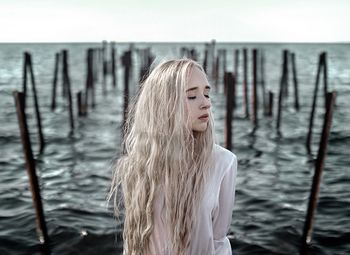 Rear view of woman looking at sea