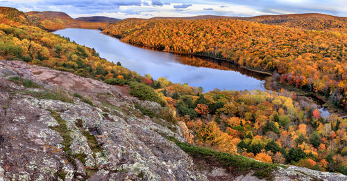 Scenic view of lake and mountains during autumn