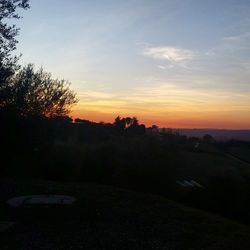 Scenic view of landscape at sunset