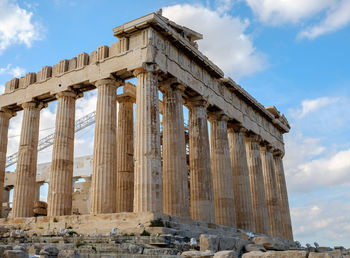 Athens, greece - february 13, 2020. ruins of parthenon on the acropolis - 447 bc - in athens, greece